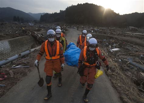 Japan overwhelmed by bodies of tsunami dead - CBS News