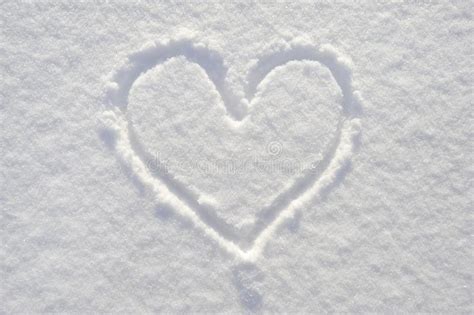 Heart in snow. A heart made in snow as a symbol of love , #Ad, #snow, #Heart, #heart, #love, # ...