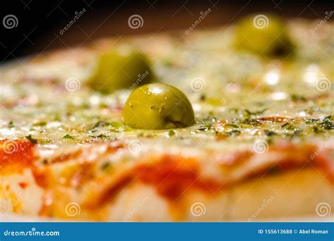 Pizza with olives stock photo. Image of lunch, evening - 155613688