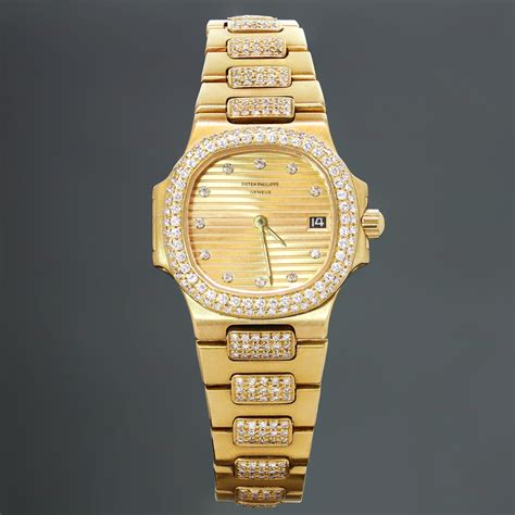 PATEK PHILIPPE Ladies 18k Yellow Gold Factory Diamond Watch.