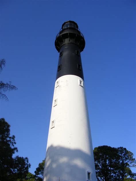 The Hunting Island Lighthouse Photograph by Elena Tudor - Fine Art America