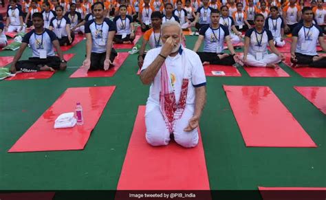 International Yoga Day: PM Narendra Modi Does Yoga In Rain, Thousands ...