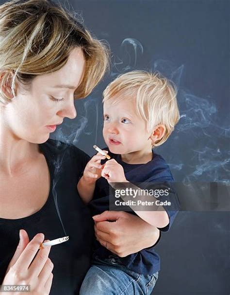 212 Mom Smoking Cigarette Stock Photos, High-Res Pictures, and Images - Getty Images