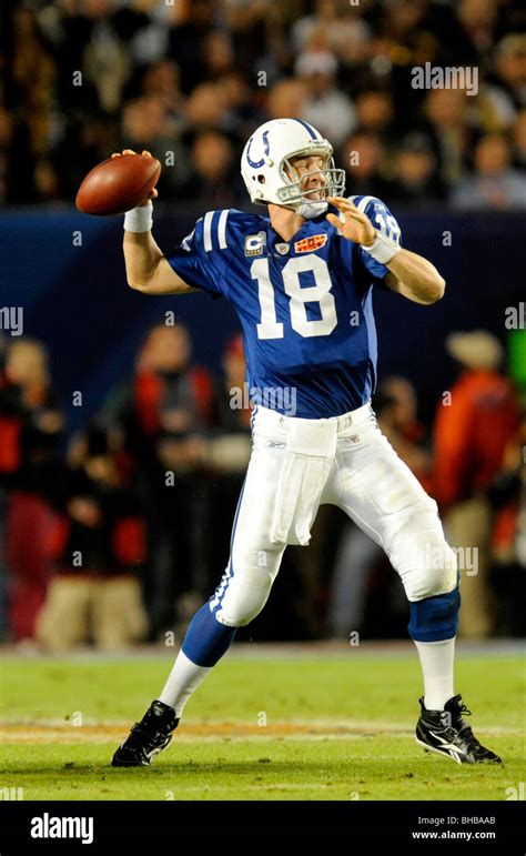 Peyton Manning #18 of the Indianapolis Colts drops back to pass against ...