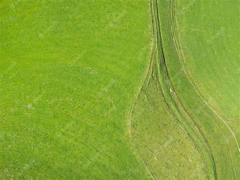 Premium Photo | Green meadow background aerial view