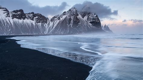 Black sand beach at Stokknes in front of the Vestrahorn mountain range ...