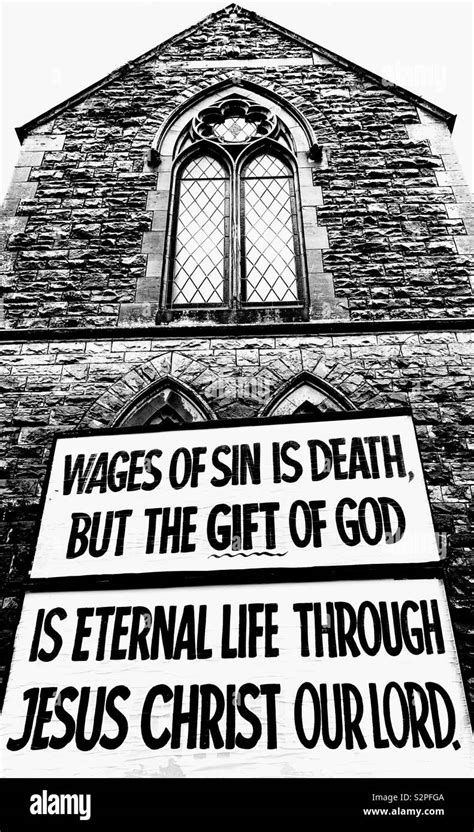 Large Billboard outside Church reading “Wages of sin is death but the gift of God is eternal ...