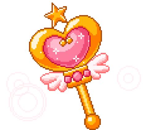 a cross stitch heart key with wings and a star