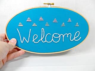 Triangle and Oval Hand Embroidered Welcome Sign | www.etsy.c… | Flickr