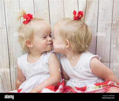 cute babies twins girls Stock Photo - Alamy