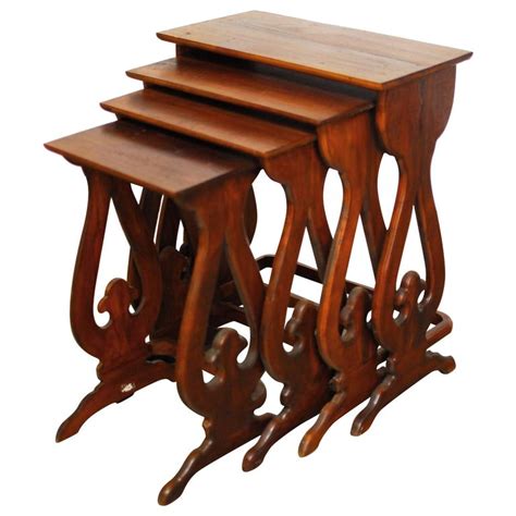 Set of Four Carved Chinese Nesting Tables For Sale at 1stdibs