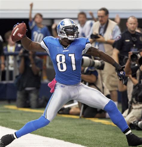 Detroit Lions wide receiver Calvin Johnson celebrates a 23-yard ...