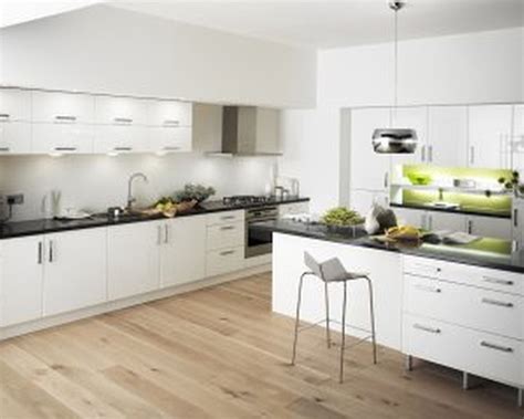 white ceramics Ikea Backsplash with white wooden kitchen cabinet having black counter… | White ...