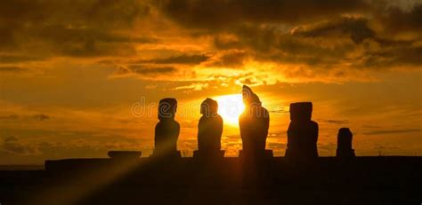 SUN FLARE: Golden Sunset Illuminates a Row of Moai Statues on Easter Island. Stock Photo - Image ...