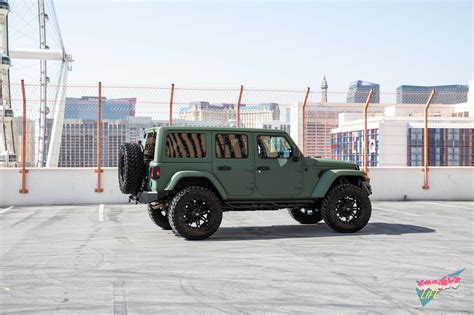 Lifted Jeep Wrangler Gets a Distinct Look with Matte Green Wrap and Off-Road Parts — CARiD.com ...