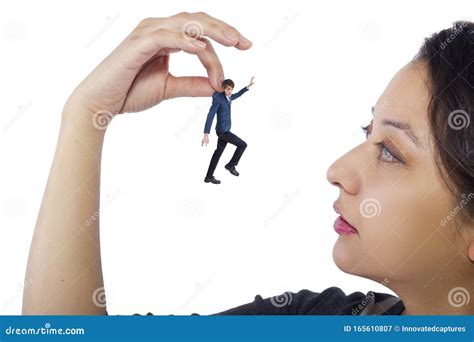 Tiny Man Trapped and Being Held by Giant Female Hands Stock Image ...