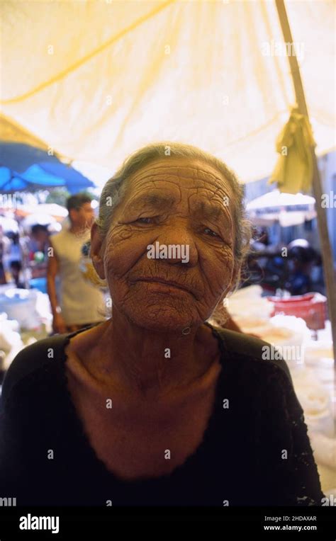 Vintage portrait of elderly woman with many wrinkles and old age ...