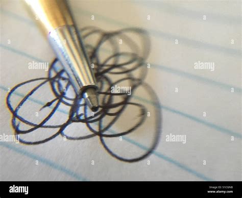 Pen paper and doodle Stock Photo - Alamy