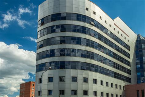 Urban Architecture, Oval Shaped Building Against the Sky. Stock Image ...