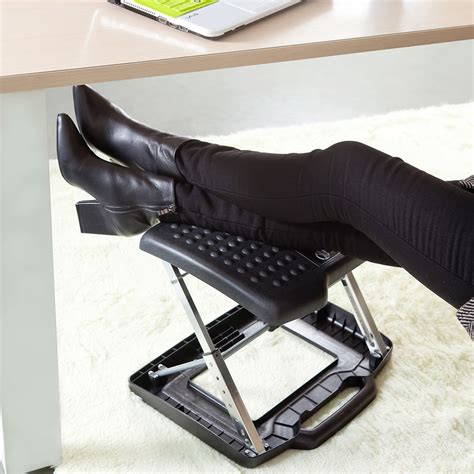 The Adjustable Height Portable Foot And Leg Rest - Hammacher Schlemmer