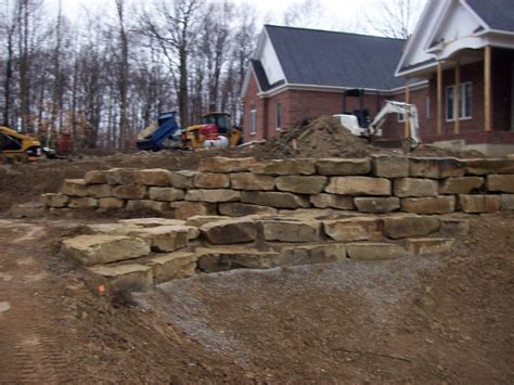 Stone Retaining Wall | Stone Seawalls | Outcropping Stone | Stone Ideas