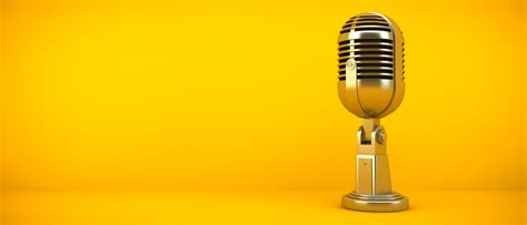 gold microphone on yellow background - Soroptimist International