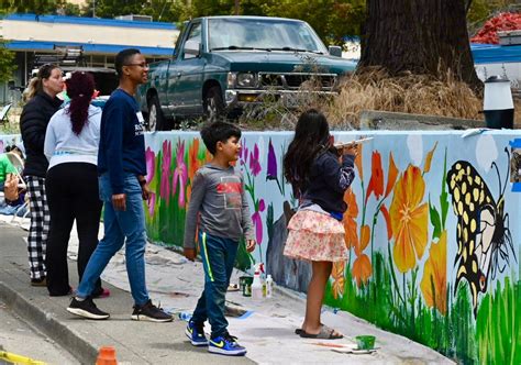 Community mural painting unites neighborhoods