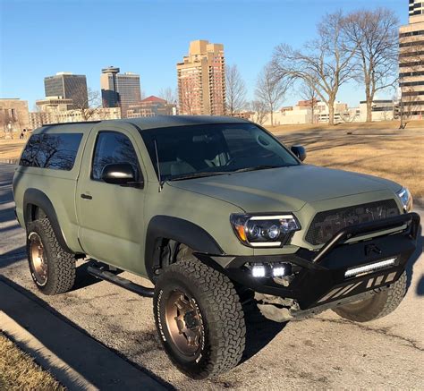 camper shell 2012 Toyota Tacoma lifted for sale