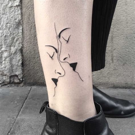 Two faces tattoo - Tattoogrid.net