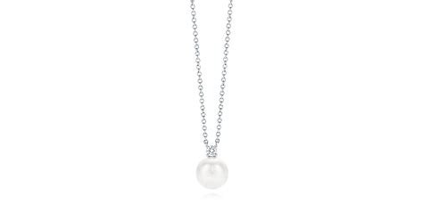 Tiffany Signature® Pearls pendant in 18k white gold with a pearl and a diamond. | Tiffany & Co.