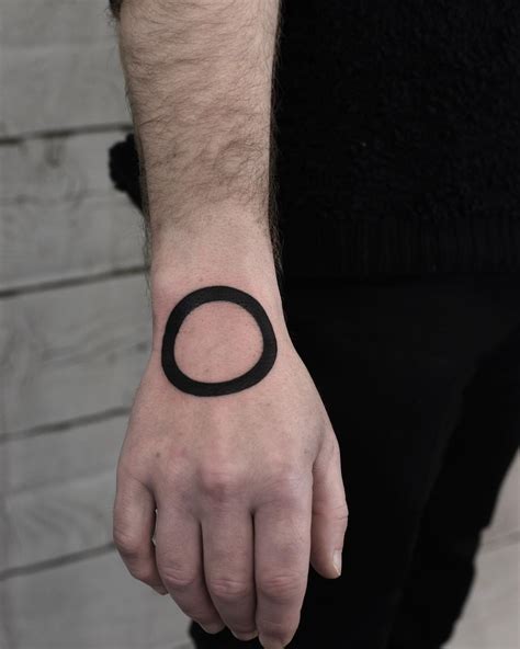 Black circle tattoo by Wagner Basei - Tattoogrid.net