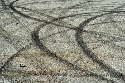 Skid marks and burnouts on the pavement. Stock Photo | Adobe Stock