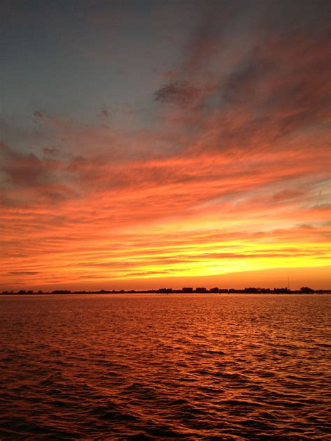 Sunset on Sarasota Bay from the Ringling Bridge pier. 9/25/12. | Sarasota bay, Sarasota real ...