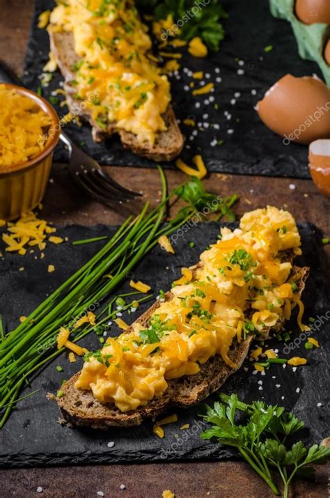 Scrambled eggs with herbs — Stock Photo © Peteer #114593756