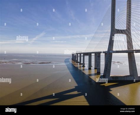 Aerial view of Vasco da Gama bridge crossing the Tagus River, one of the longest suspended ...