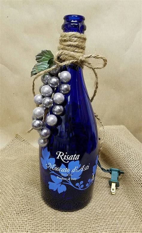 Blue Wine Bottle with Lights | Blue wine bottles, Lighted wine bottles, Bottle art