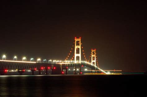 Mackinac Bridge Lights at Night Photograph by Nathaniel Susan - Pixels