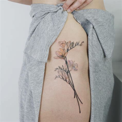 Freesia by @tattooist_flower - Tattoogrid.net