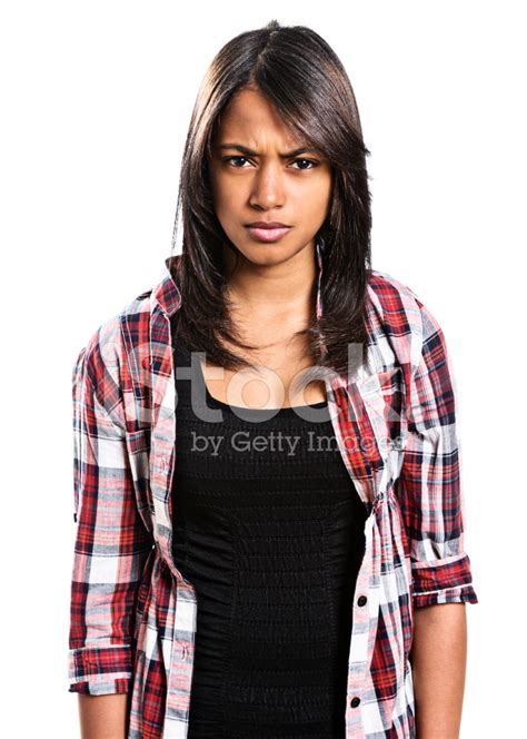 Angry Young Woman Glares At Camera, Frowning Stock Photo | Royalty-Free | FreeImages