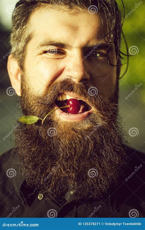 Bearded Man with Red Cherry Stock Image - Image of emotional, nature ...