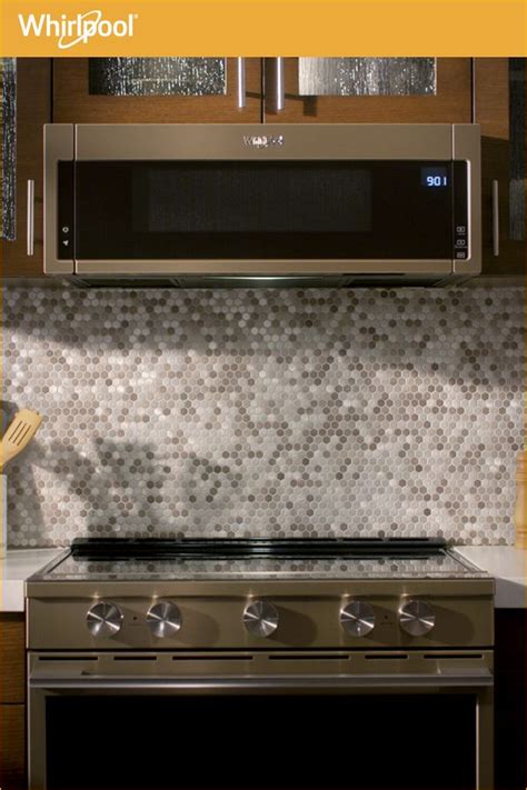 Learn about the new Whirlpool® Low Profile Microwave Hood *Based on 24” minimum install for ...