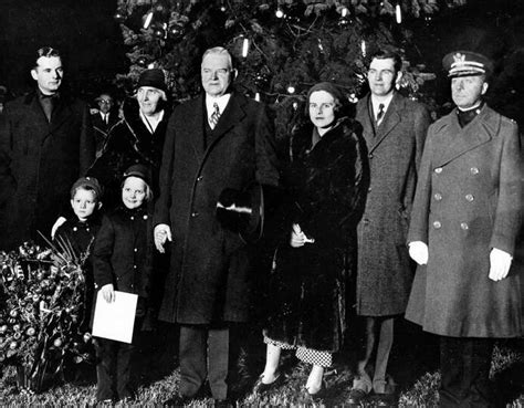 President Herbert Hoover and family pose in front of a Christmas... Photo-3853281.53499 ...