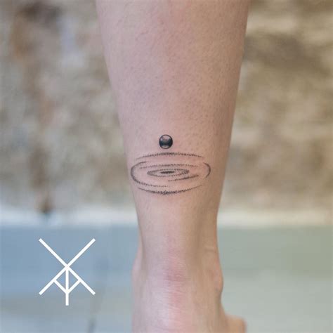 Small planet and a black hole - Tattoogrid.net