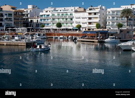 Cala Bona, Majorca, Spain, October 15, 2019, A small fishing boat returning to the picture ...