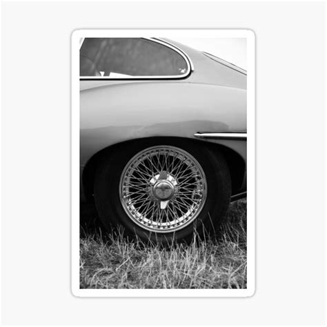 "Wire wheels of a Jaguar E-Type" Sticker for Sale by AdamT1991 | Redbubble