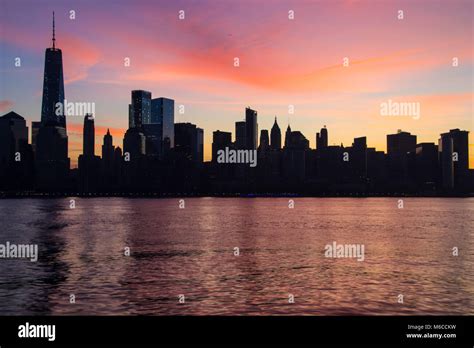 New York City Skyline at Sunrise Stock Photo - Alamy