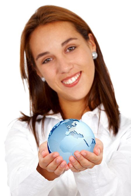 business woman holding a globe map in her hands isolated over a white background | Freestock photos