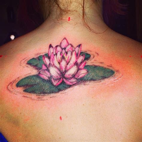 Lotus flower / lily pad tattoo by - Ranz | Flower tattoo shoulder, Small tattoos for guys, Water ...