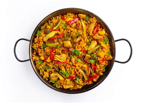 Premium Photo | Spanish paella rice with chicken on white background