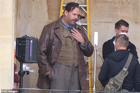 Timothee Chalamet enjoys a coffee break in the rain while filming Wonka ...